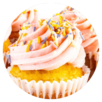 Keto vanilla cupcakes with powdered allulose frosting.