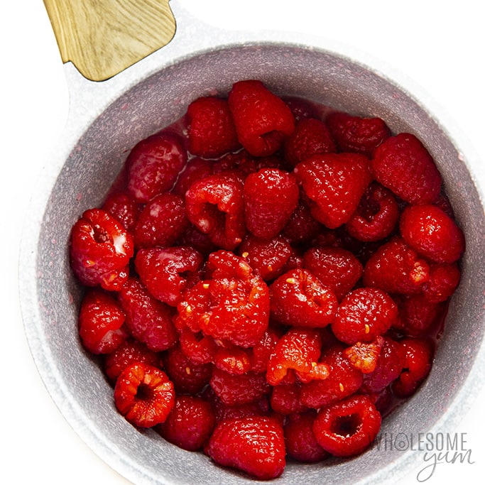 Fresh raspberries in saucepan 