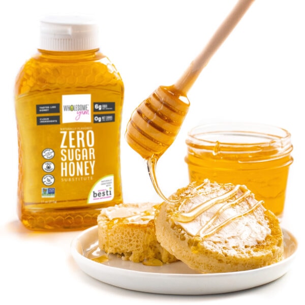 Zero sugar honey being drizzled on bread.