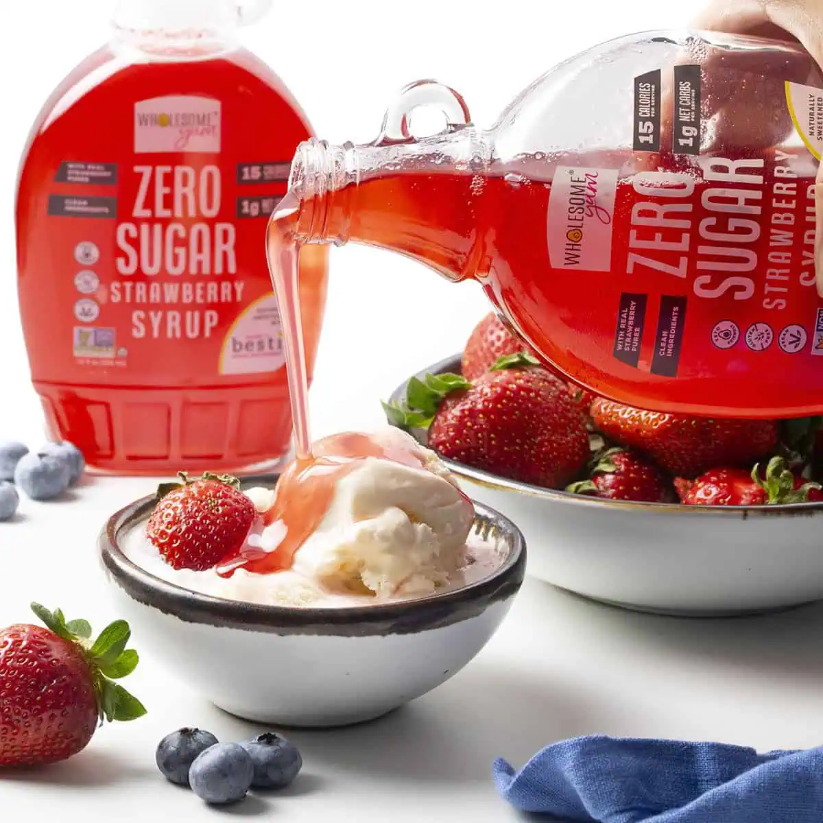 Wholesome Yum Sugar Free Strawberry Syrup Over Ice Cream.