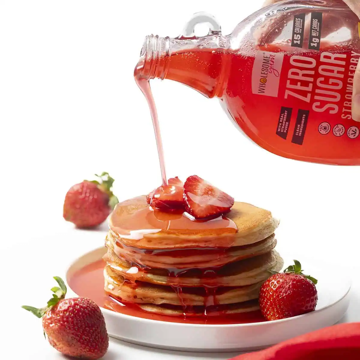 Wholesome Yum Sugar Free Strawberry Syrup Over Pancakes.